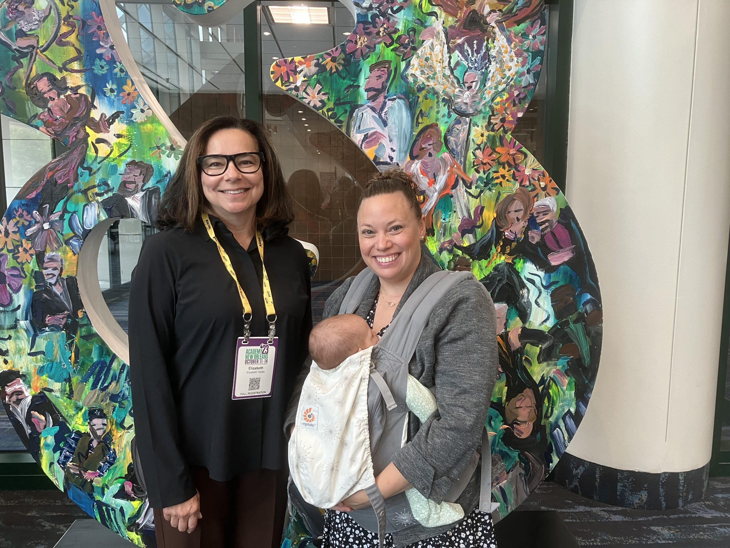 Dr. Wyles and Dr. Sicks, with her baby, take a break in new orleans to talk about leadership development