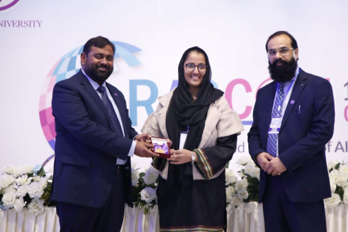 Dr. Jabbar receives a Gold Medal as the Best Paper Presenter at RASCON from Prof. Dr Naveed Babur